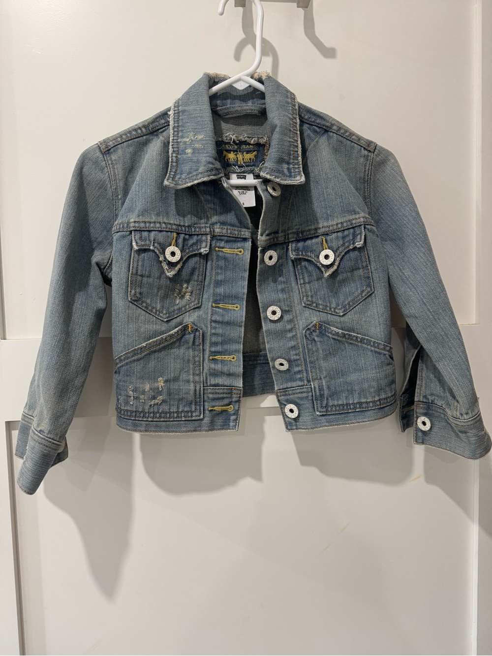 Vintage Levi’s Cropped Distressed Denim Trucker Jacket - Light Wash (Size Small)